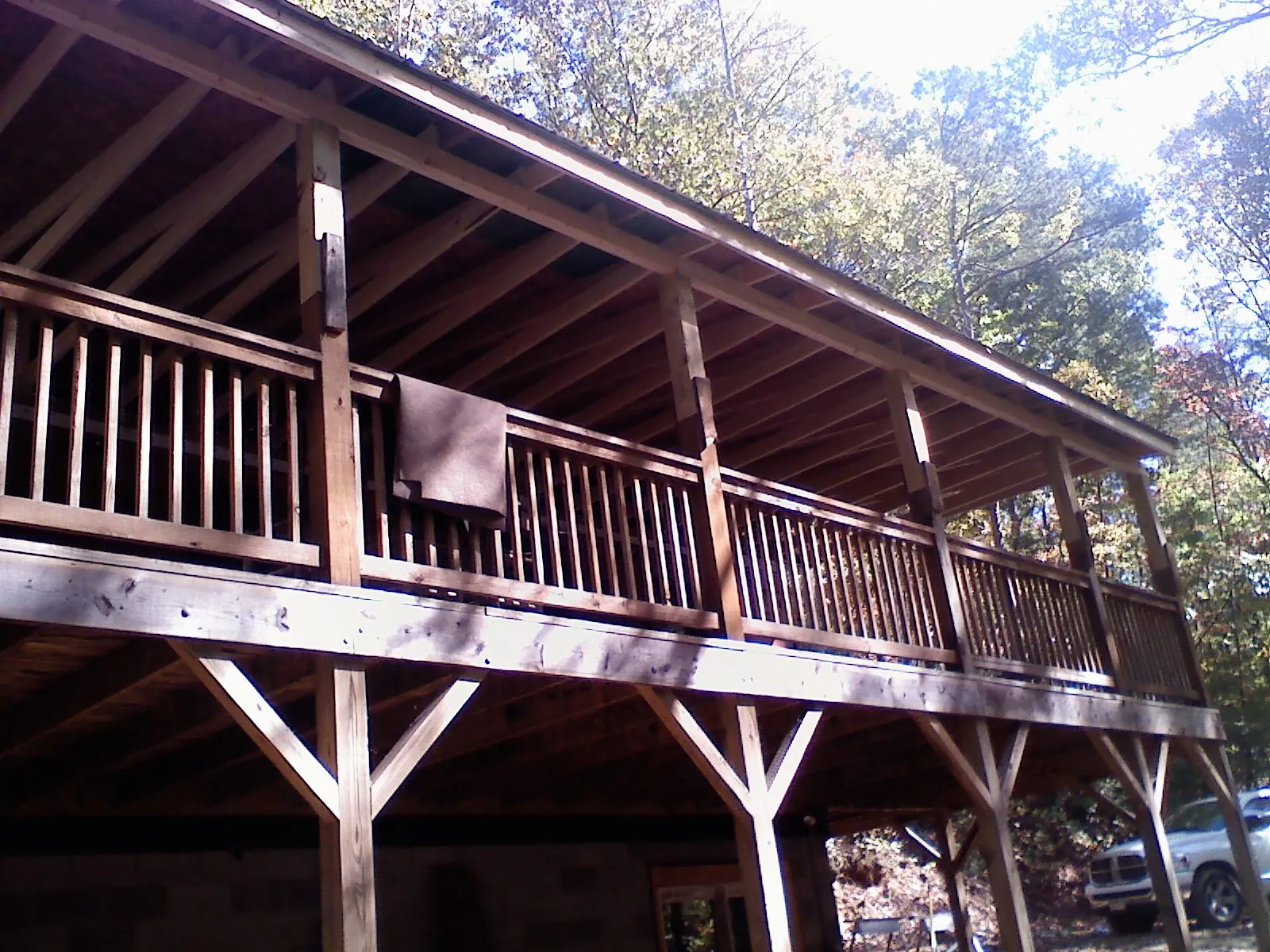 Timber framing under a new elevated porch and deck — Roof Leak Repair in Elma by Roofing Brothers